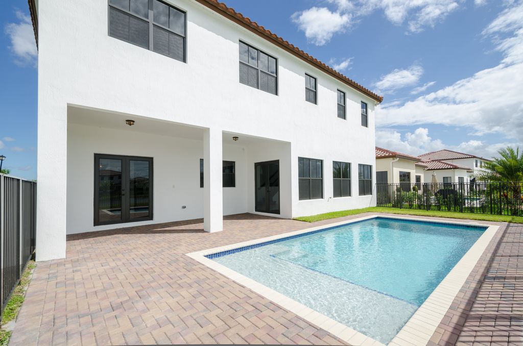 Pembroke Pines impact windows and doors in rear of house